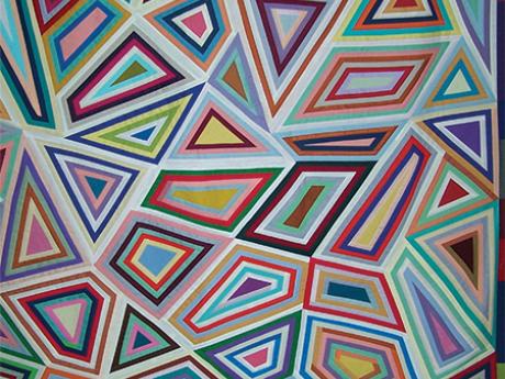 Handmade quilt multicolor geometric pattern. 