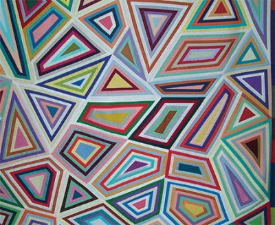 Handmade quilt multicolor geometric pattern. 